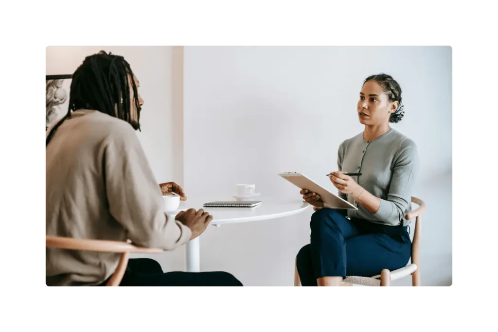 2 co-workers talking