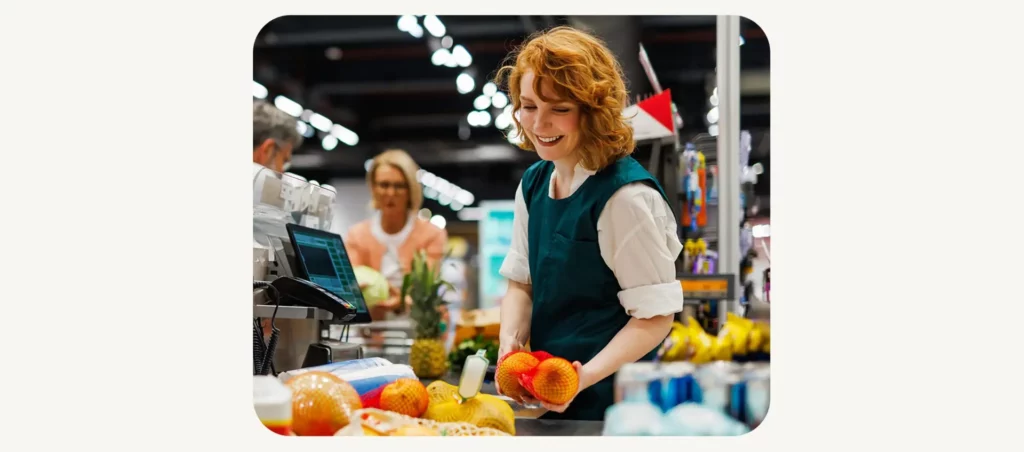 Cashier happy at work
