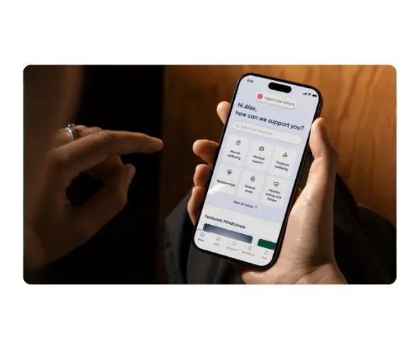 Someone holding a phone displaying the Sonder app