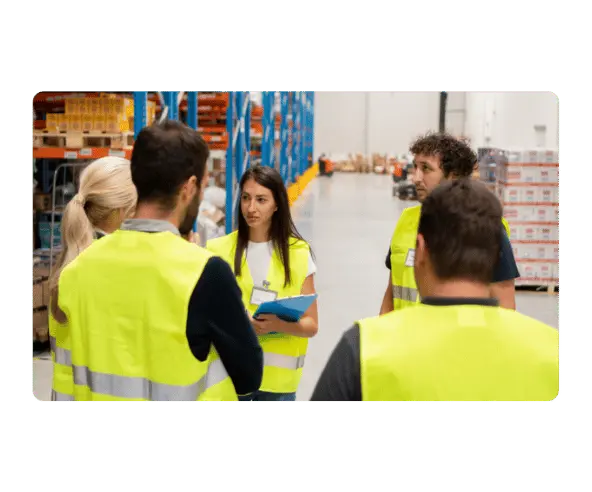 Warehouse workers talking
