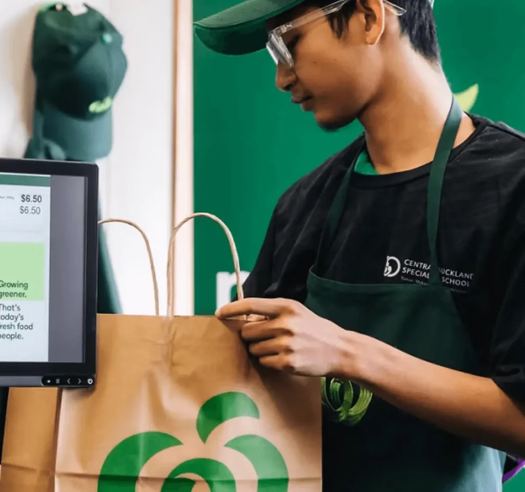 Woolworths employee at the checkout