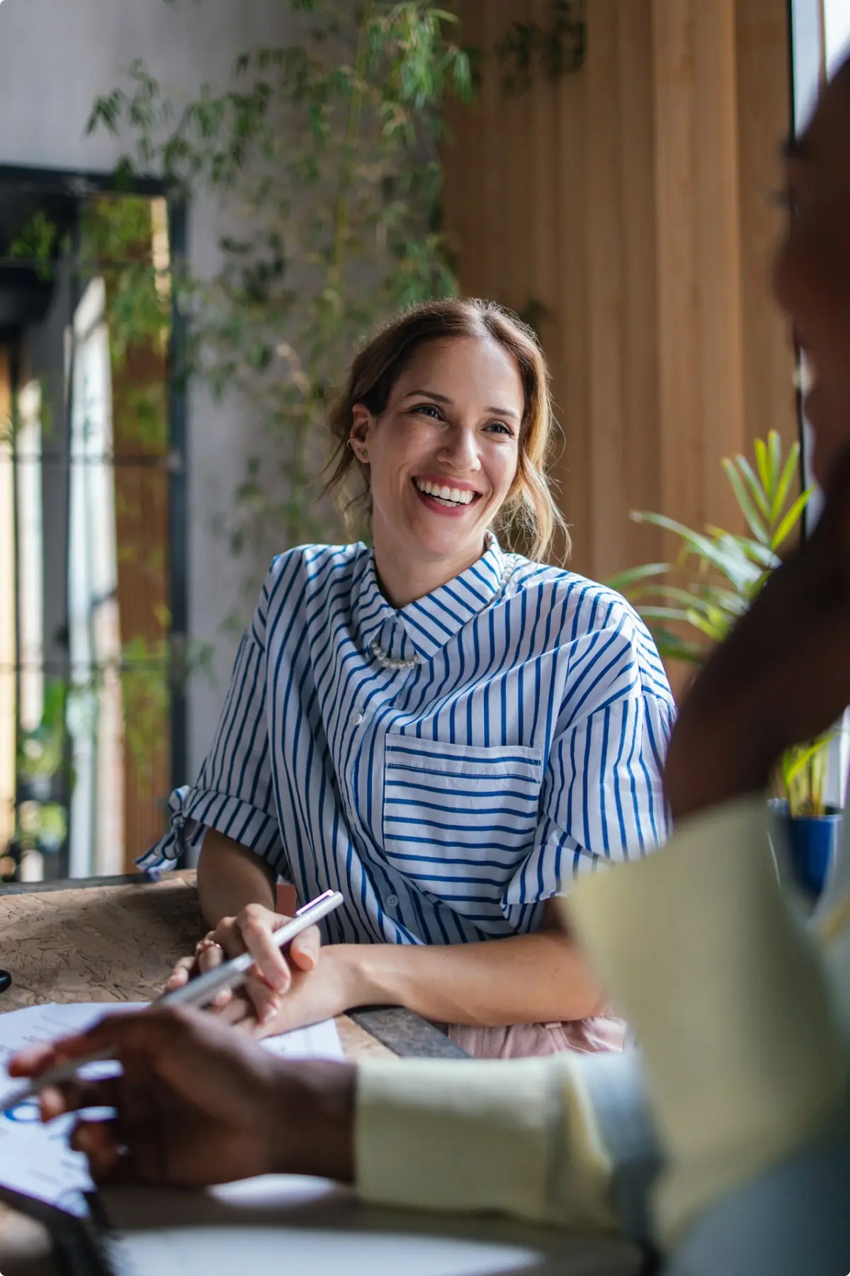 2 office workers smiling