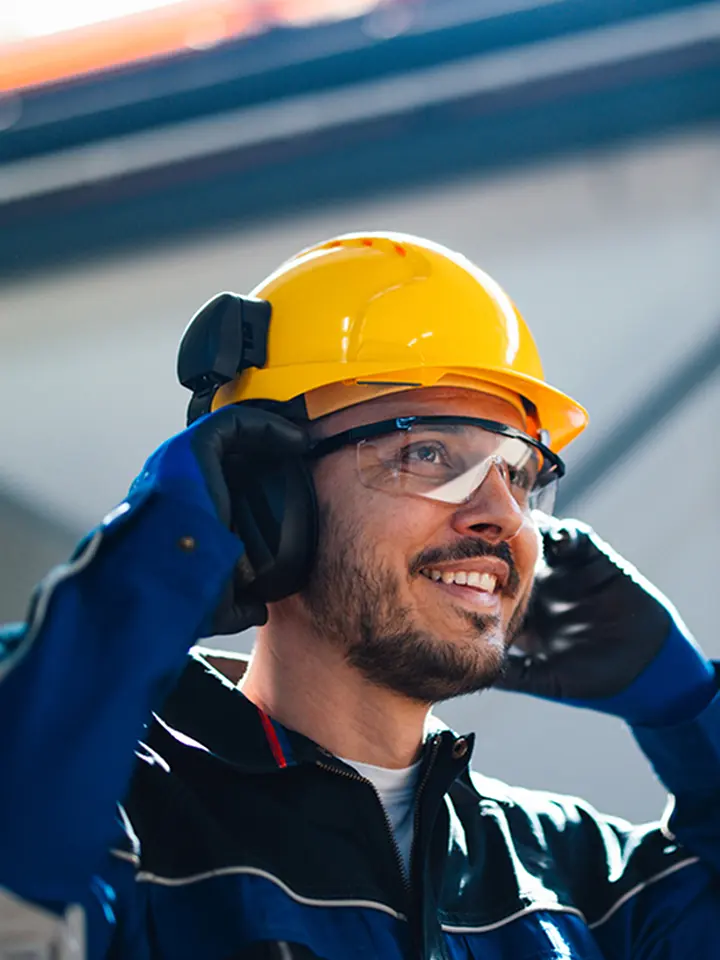 Factory worker smiling