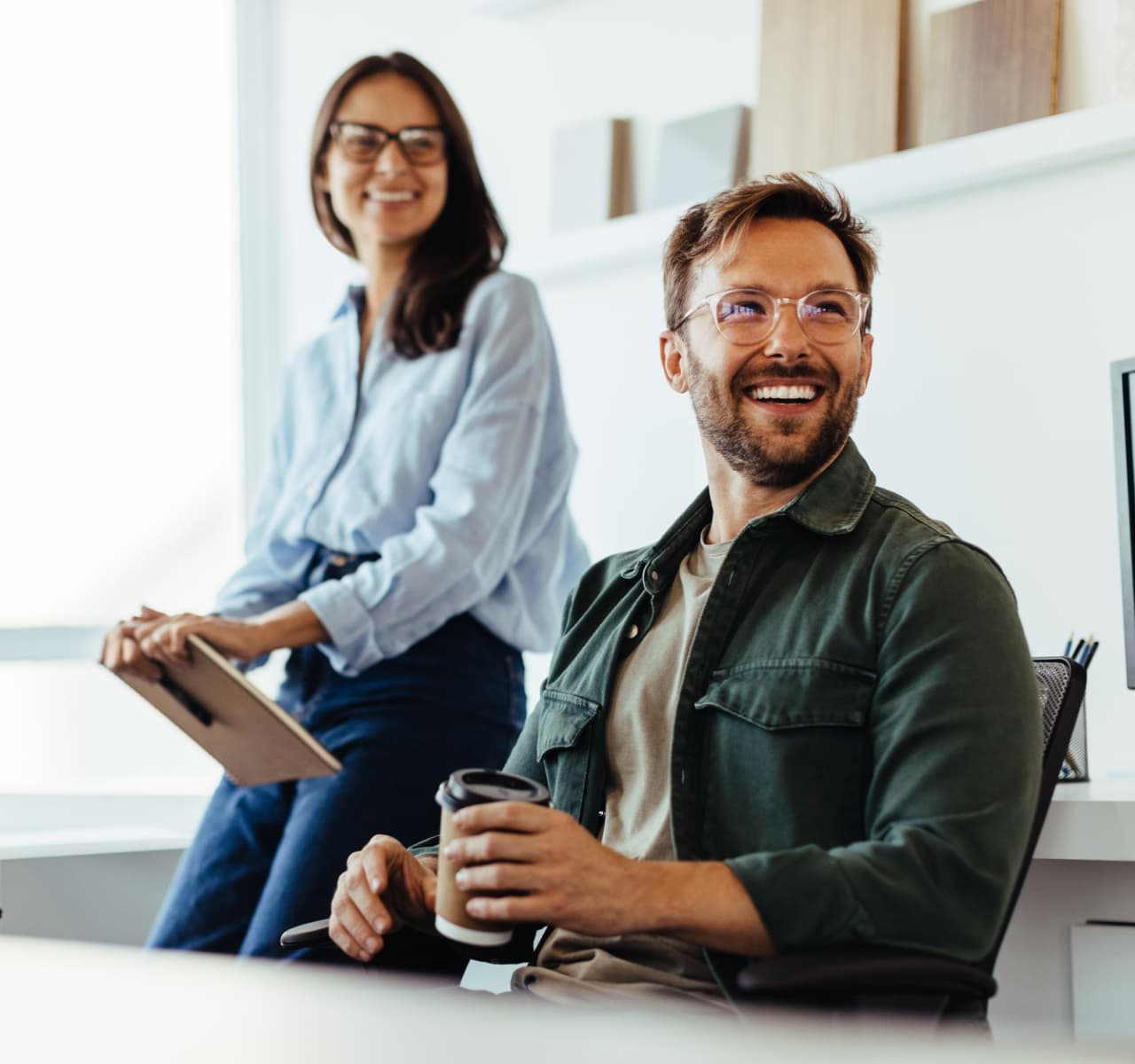 Professionals listening to a discussion in an office