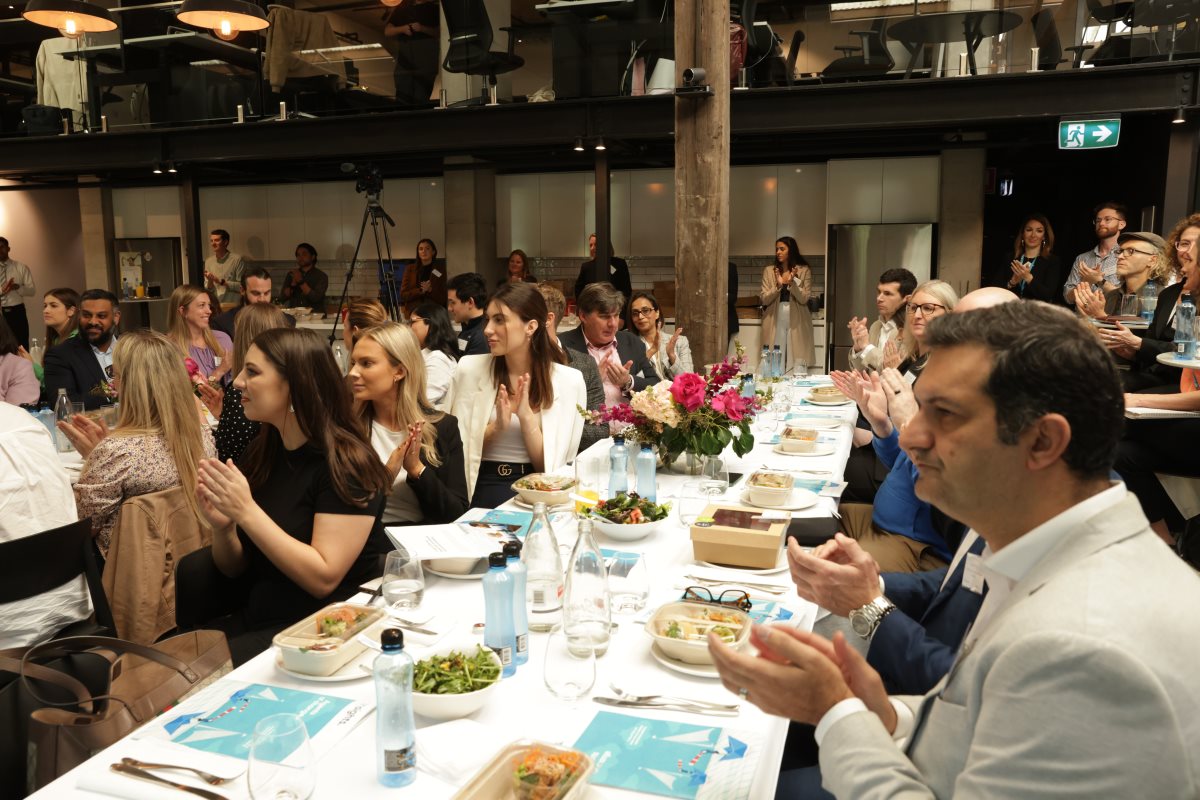 Guests at Agents of change event clapping.