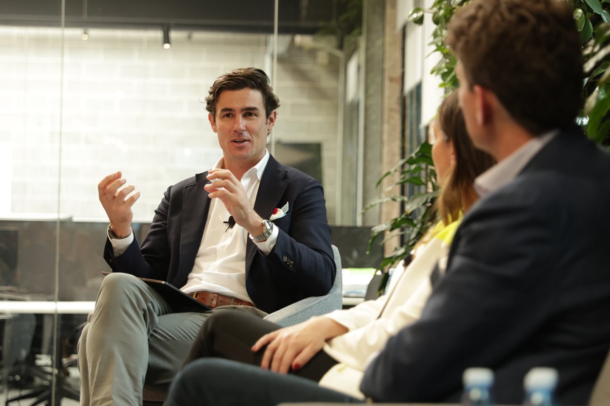 Christopher Marr having a discussion at t he agents of change event.