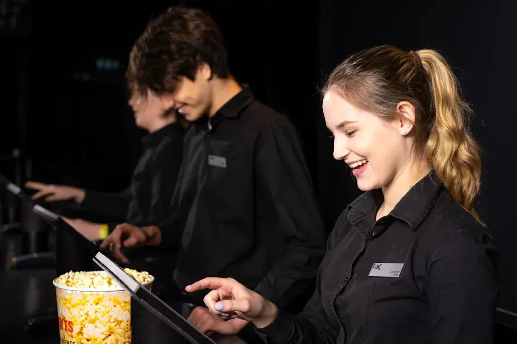 Hoyts employees working at one of their cinemas