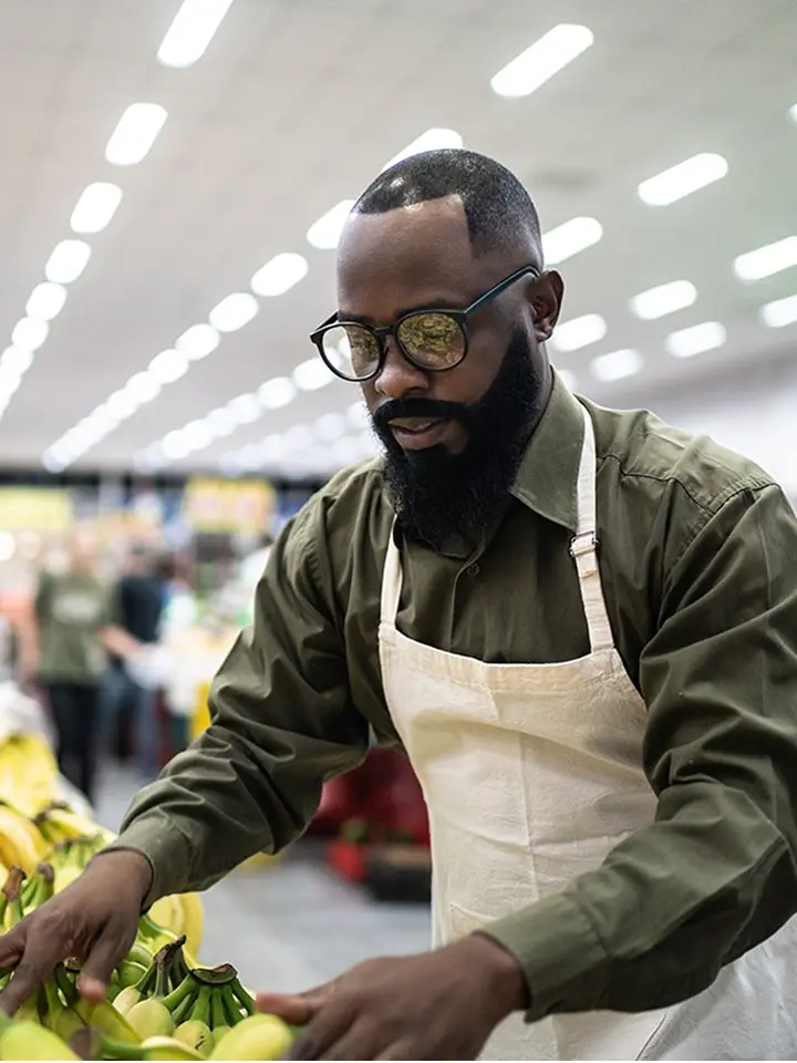 Grocery shop worker in a supermarket