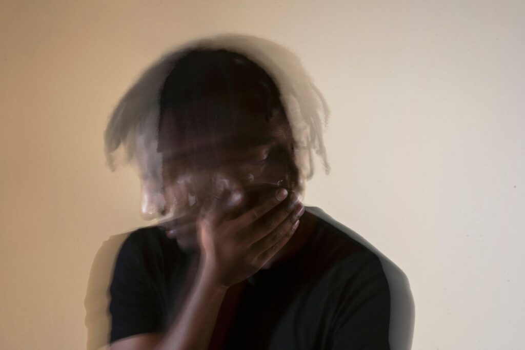 young man blurred, anxiety