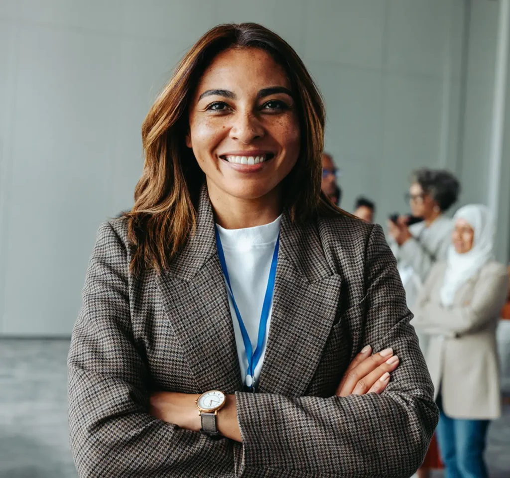 State of Employee Health and Wellbeing Report 2026 - woman smiling