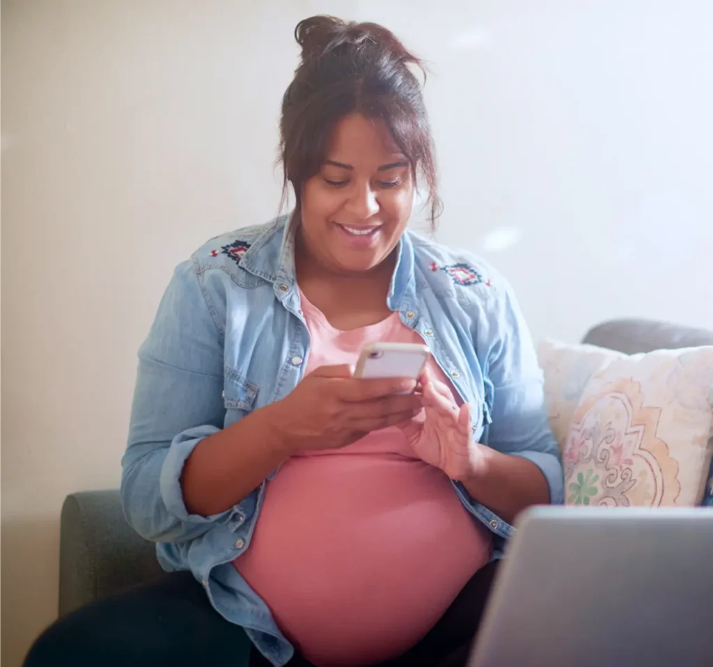 Pregnant woman using the Sonder app