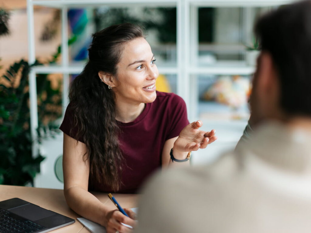 A woman in an office setting responding to change