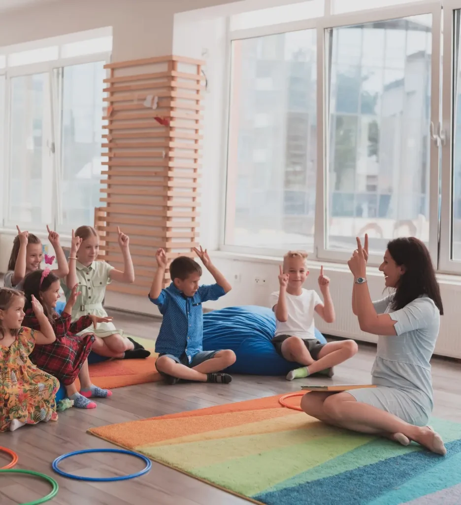 Teacher and kids at a early learning centre